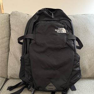 North Face backpack with Coinbase logo